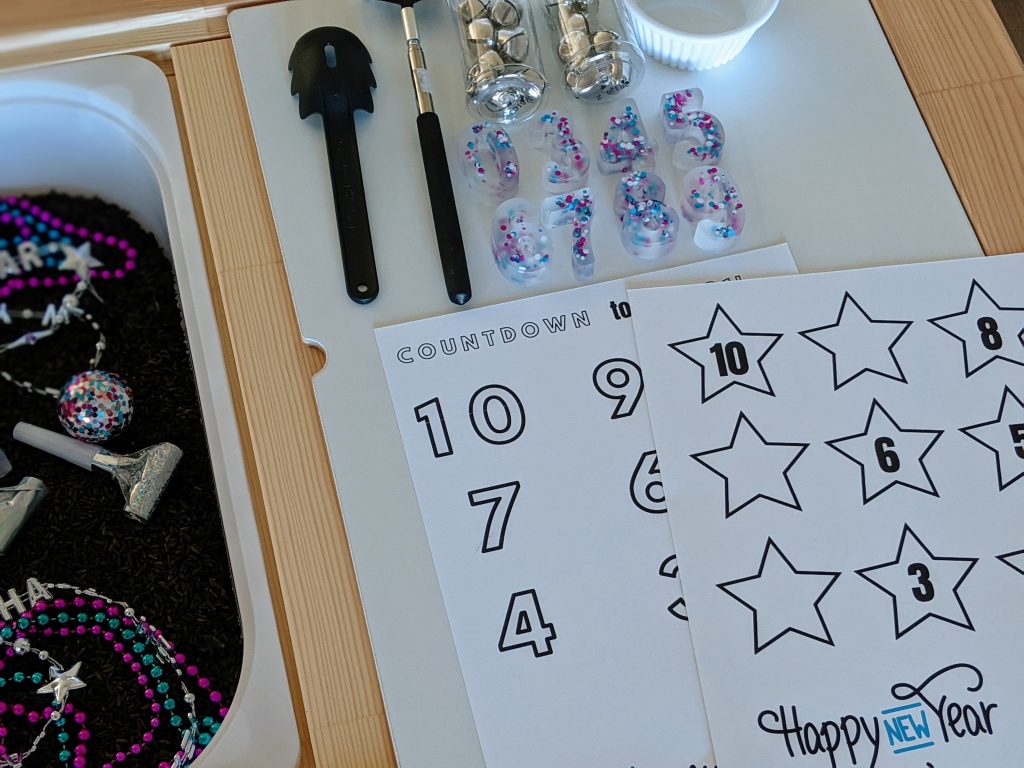 New Year's Sensory Bin with free printable