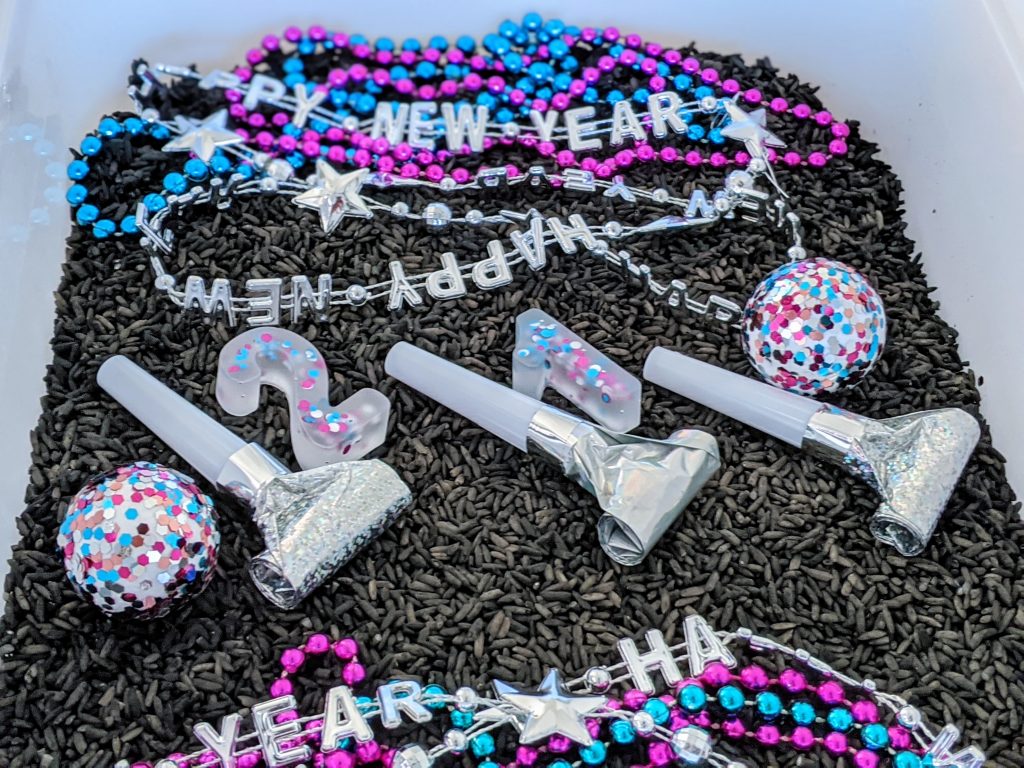 New Year's Sensory Bin with free printable