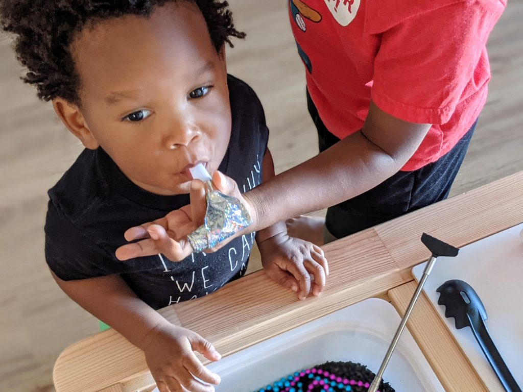 New Year's Sensory Bin with free printable for kids