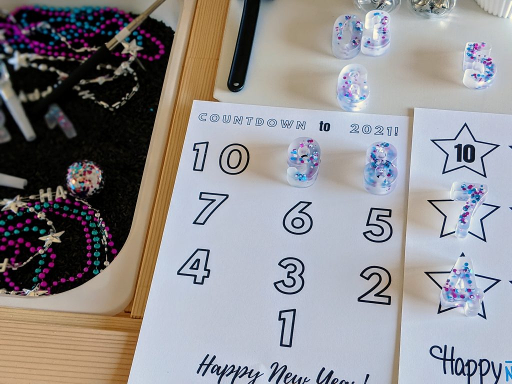 New Year's Sensory Bin with free printable
